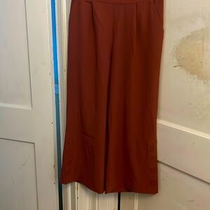 Sky’s Are Blue Straight Leg, mid calf dress pants. Rust color